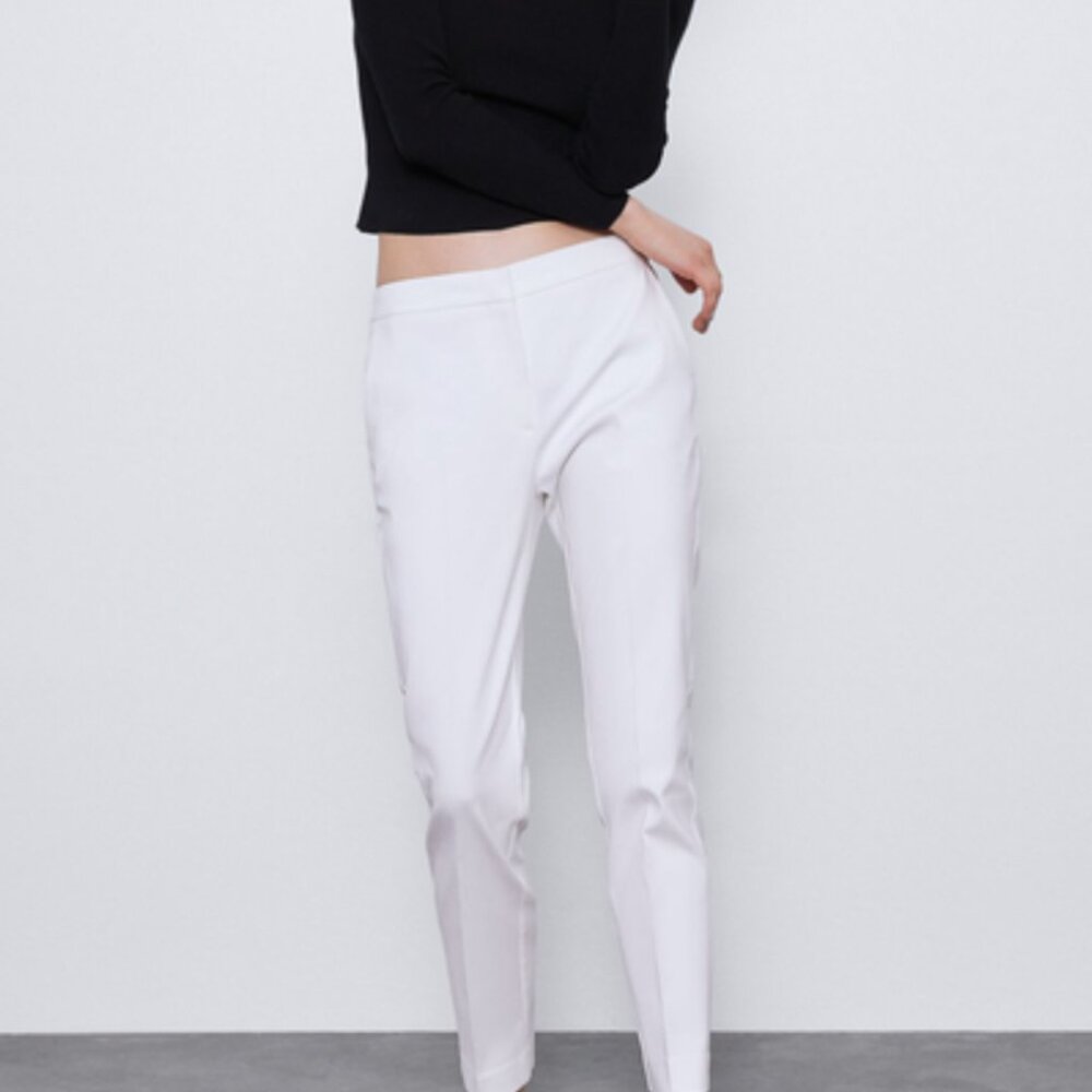 White Zara pants. Black stretch waist band.